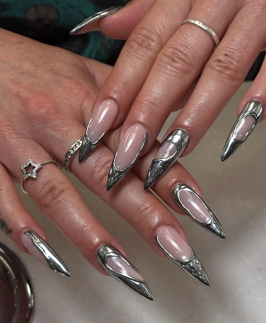 Stiletto Nails with Negative Space and Sculpted Silver Frames