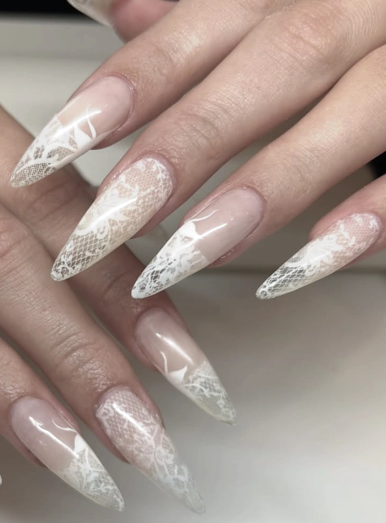 Stiletto Nude Nails with White Lace Detail