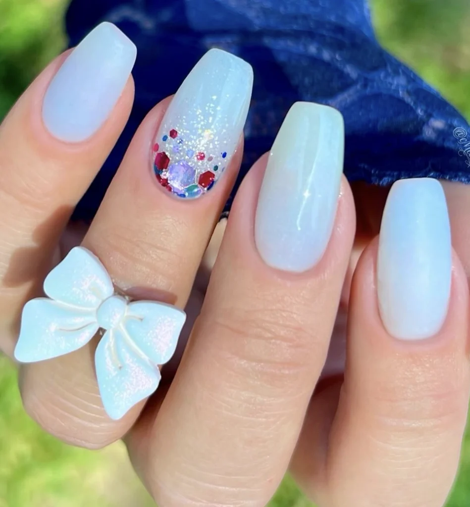Stylish Square Milky White Nails with Glitter Ombre and Colorful Gems