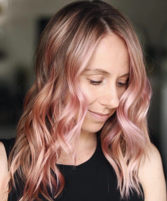 Subtle Waves with Rosy Toned Strawberry Blonde Hair