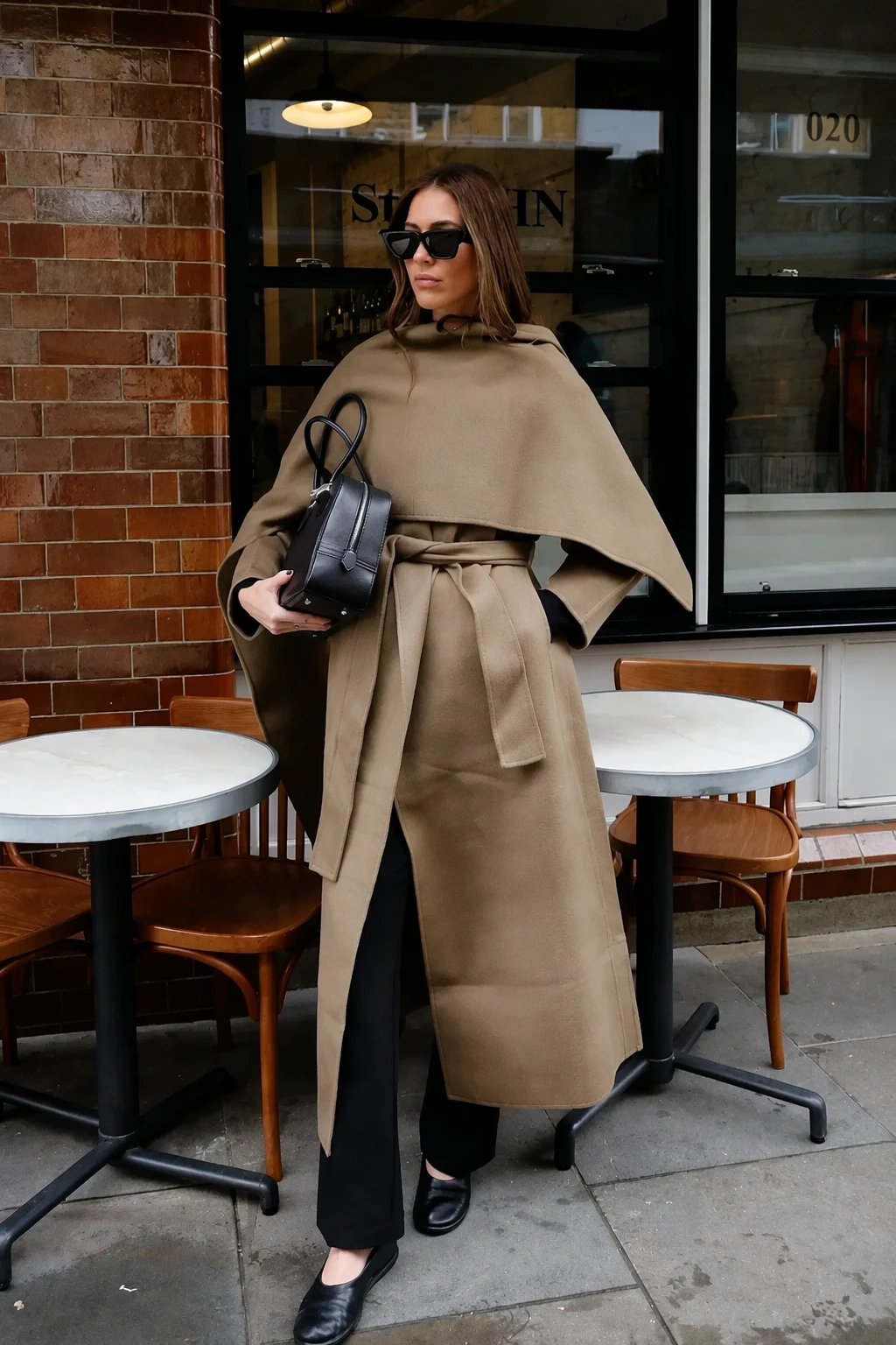 Tan Cape Coat + Black Wide Leg Pants + Black Leather Bag