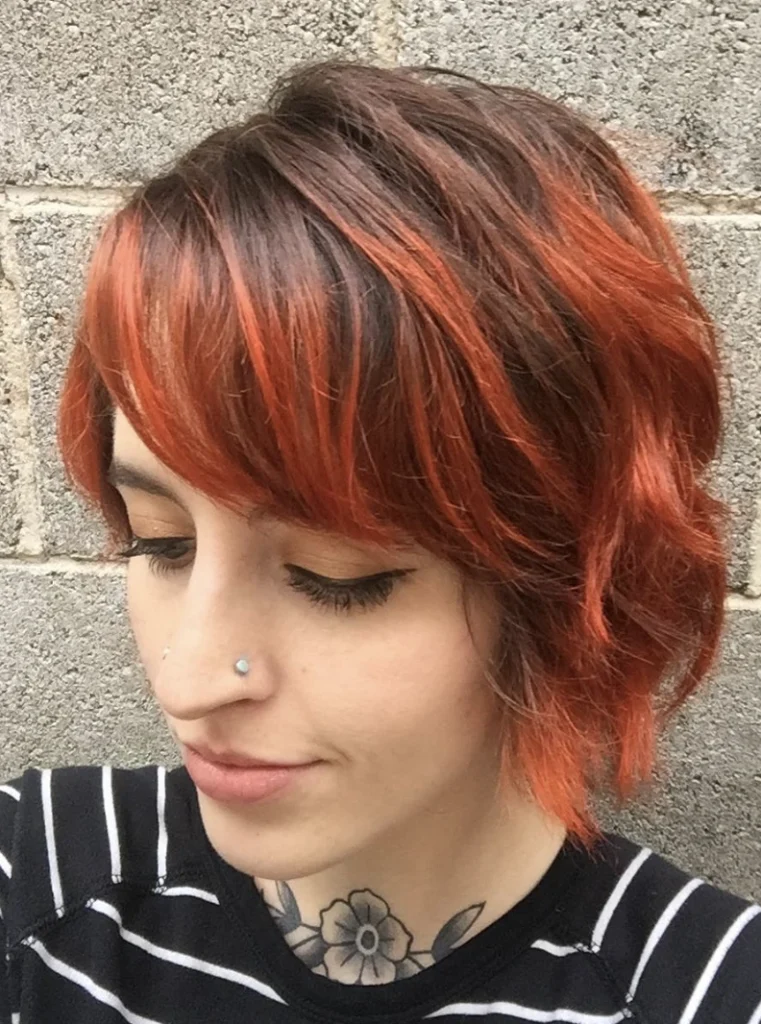 Textured Bob with Vibrant Copper Highlights for Short Hair
