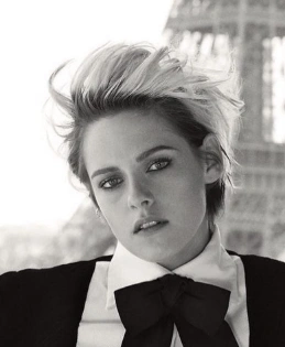Textured Pixie Cut with Edgy Layers in Short Hair Tomboy Style