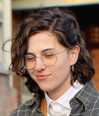 Textured Wavy Bob with Side-Swept Bangs for Short Hair Tomboy Style