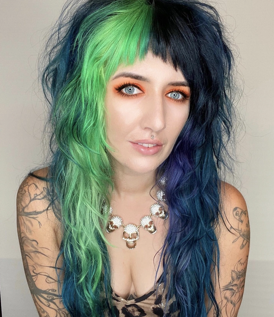 Vibrant Layered Waves with Halloween Hair Dye in Green, Black, and Blue