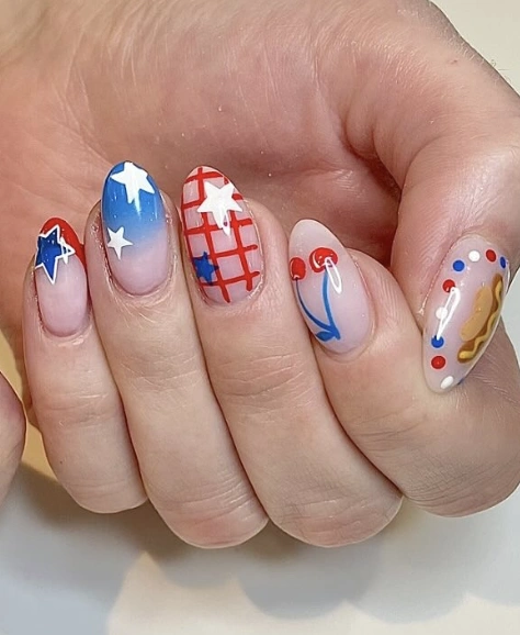 Vibrant Ombre Almond Nails Featuring Red, White, and Blue Stars and Playful Patterns for July Nail Designs