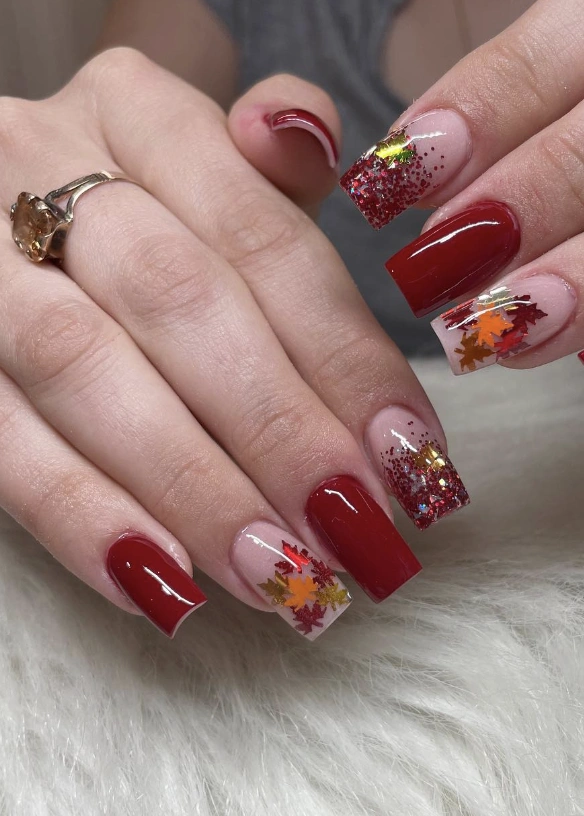 Vibrant Red and Clear Square Nails with Autumn Leaf Accents and Glitter Details
