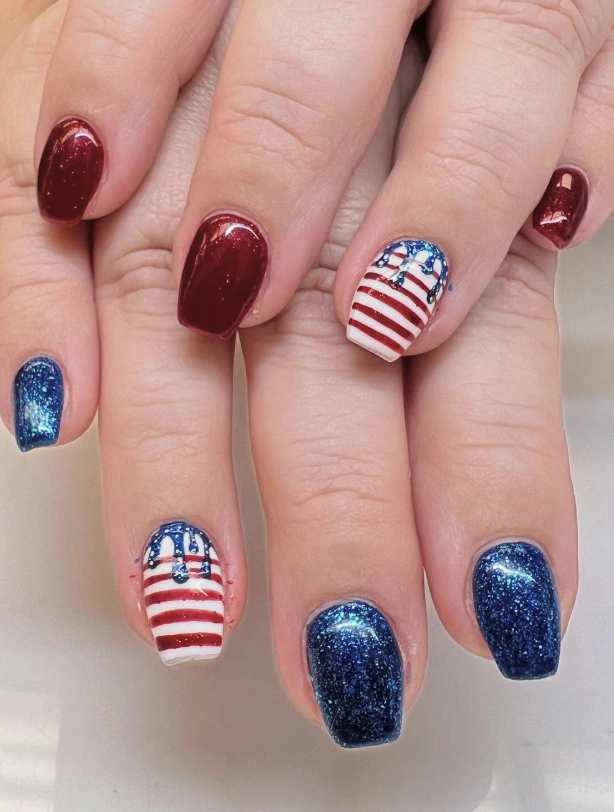 Vibrant Square Nails with Red, White, and Blue Glitter Accents and Patriotic Stripes