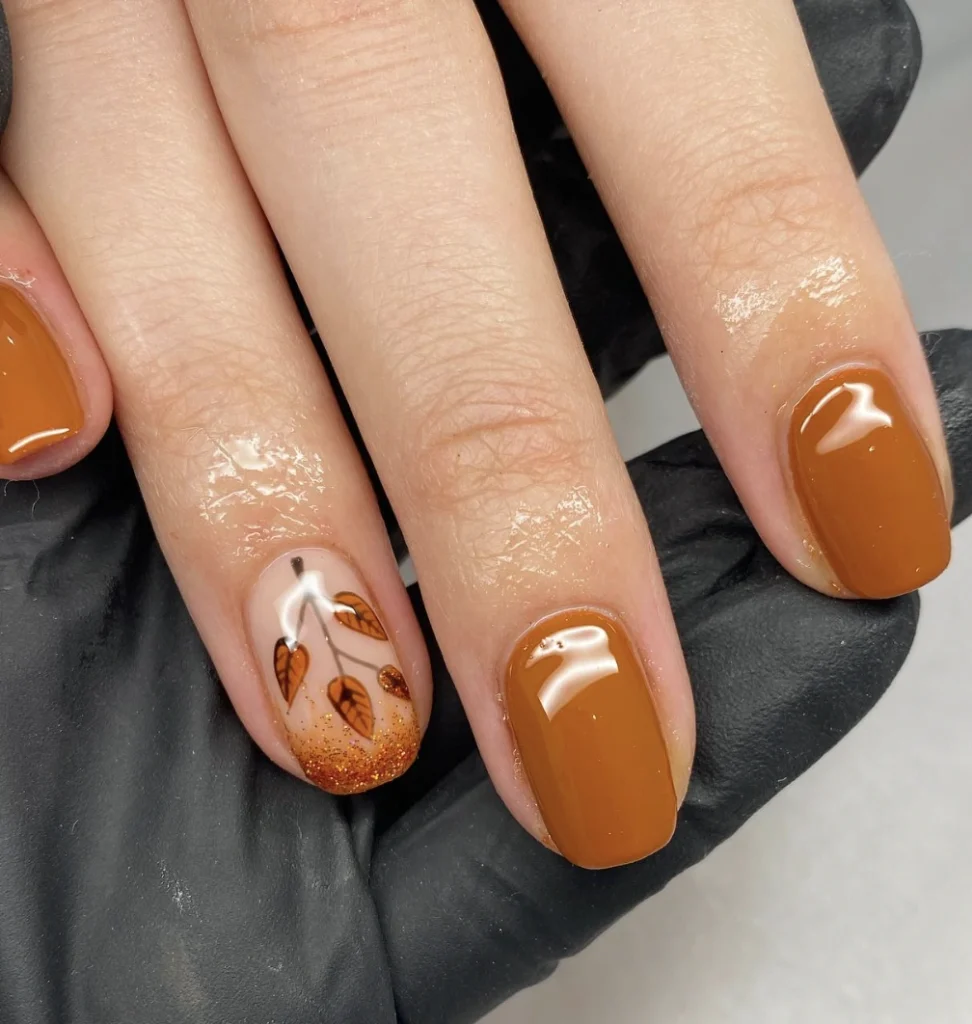 Warm Pumpkin Spice Square Nails with Glittery Autumn French Tips and Leaf Accents