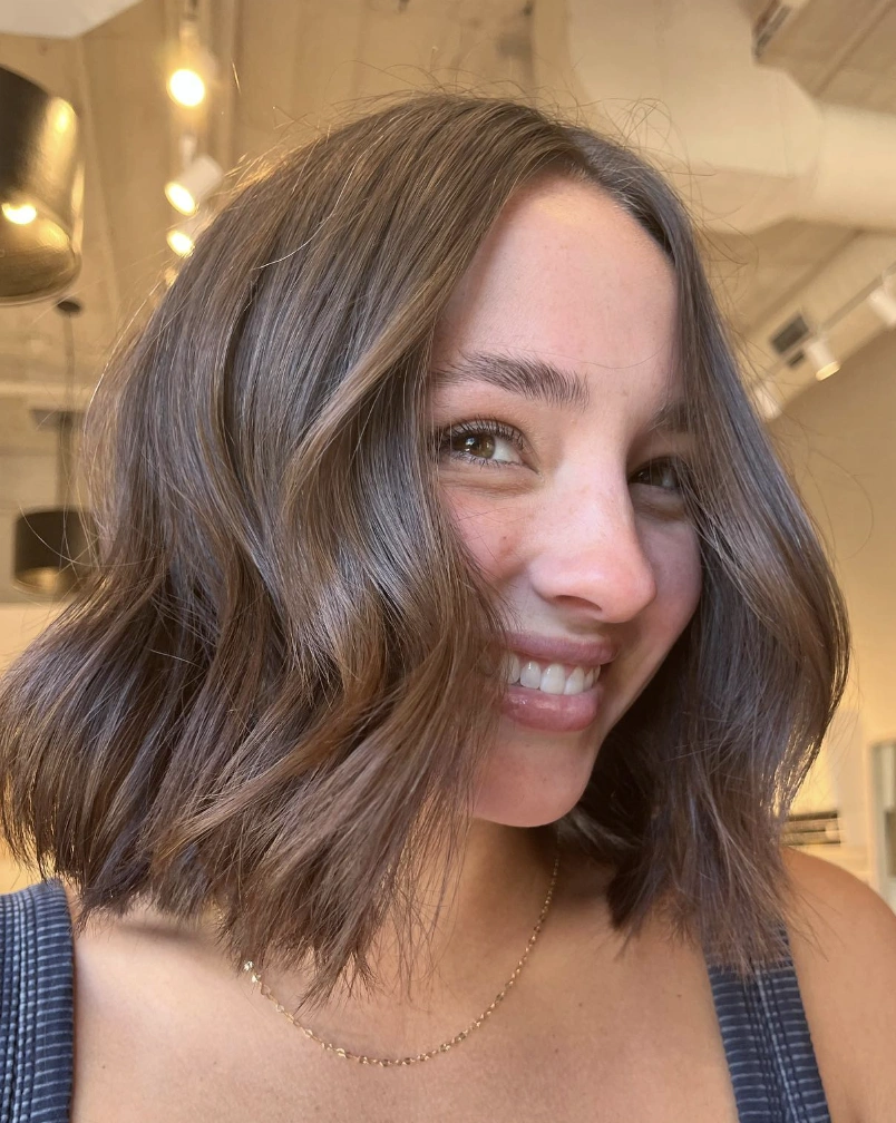 Wavy Brunette Bob with Subtle Highlights