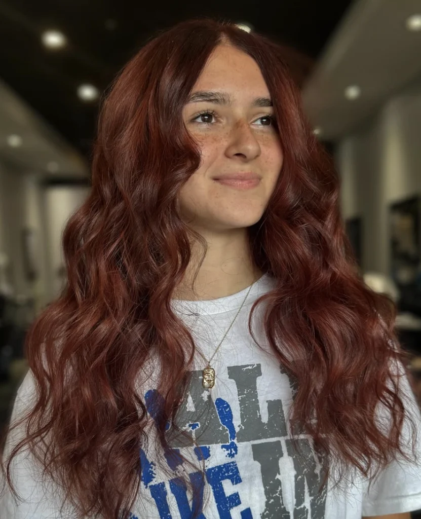 Wavy Locks for Medium-Length Autumn Brown Hair with Subtle Highlights