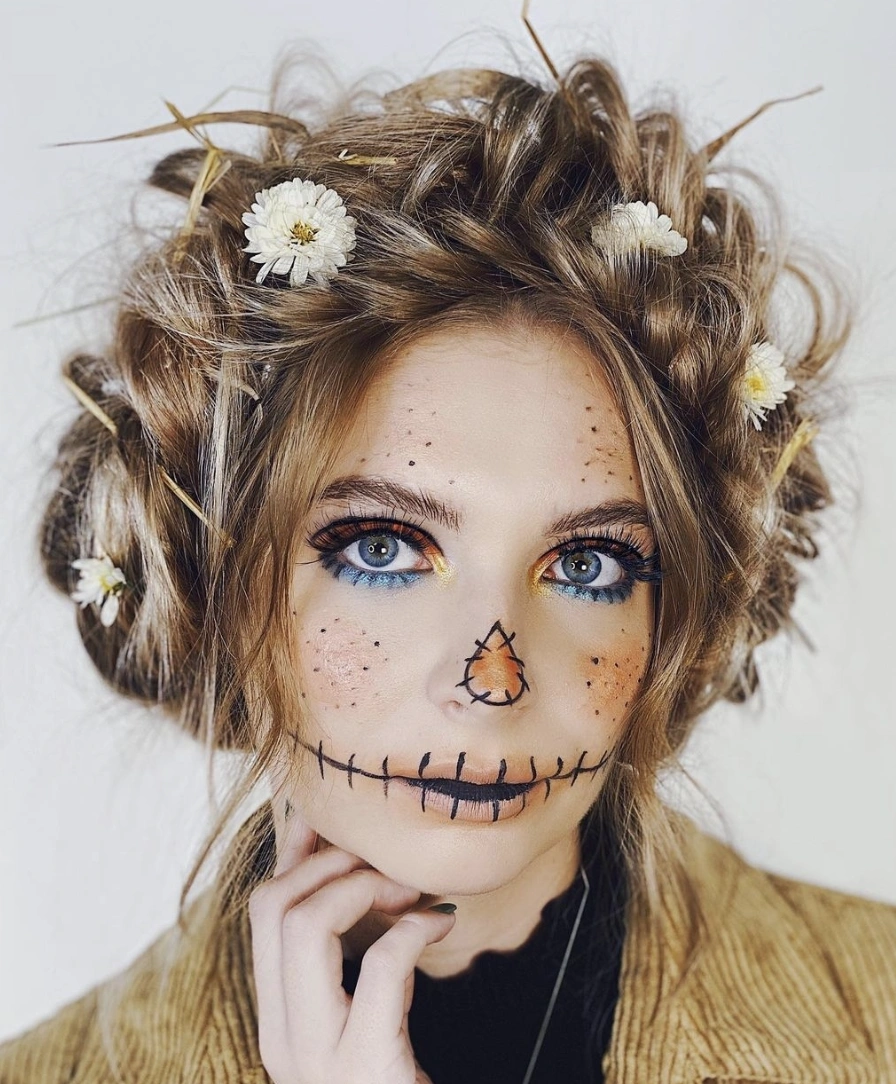 Whimsical Curly Updo for Hair Adorned with Daisies and Twigs