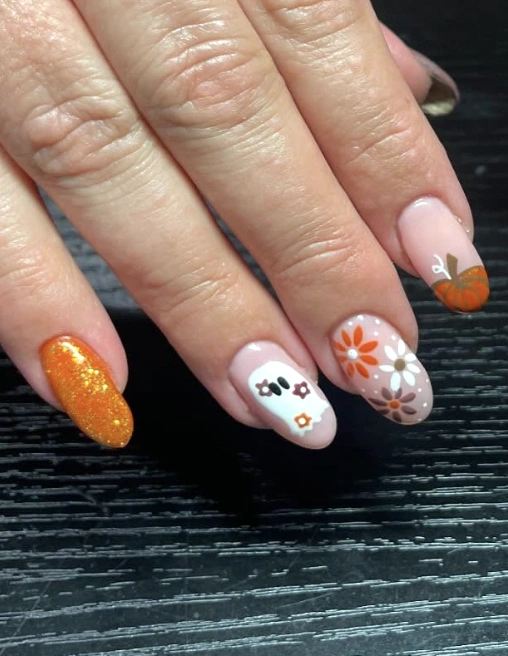 Whimsical Floral Designs and Cute Pumpkin Accents