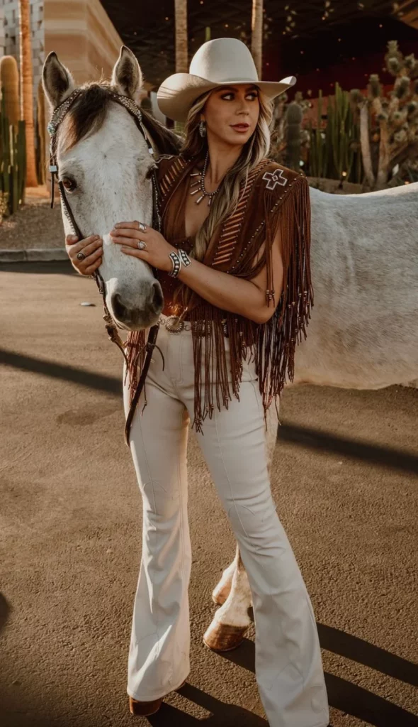 White Cowboy Hat + Brown Fringe Vest + White Flared Pants + Brown Western Boots