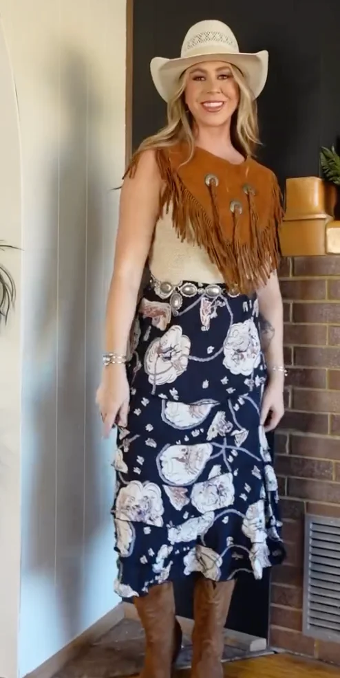 White Cowboy Hat + Tan Fringe Top + Navy Floral Midi Skirt + Brown Cowboy Boots