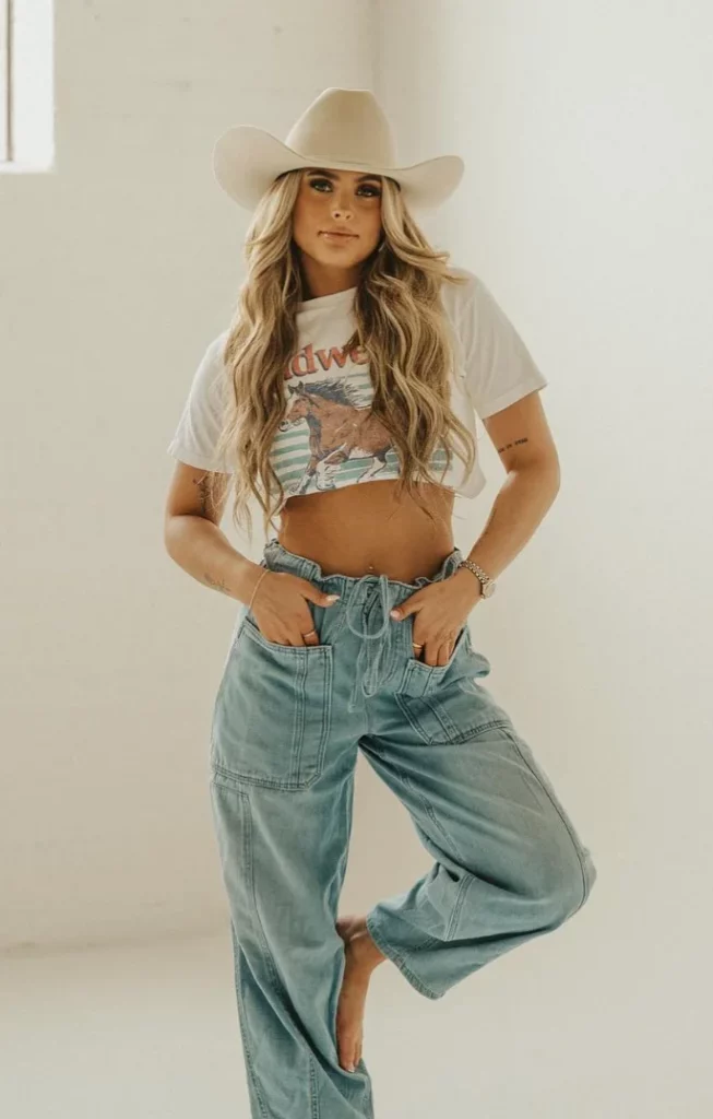 White Graphic Cropped T-Shirt + Light Wash Wide-Leg Jeans + White Cowboy Hat
