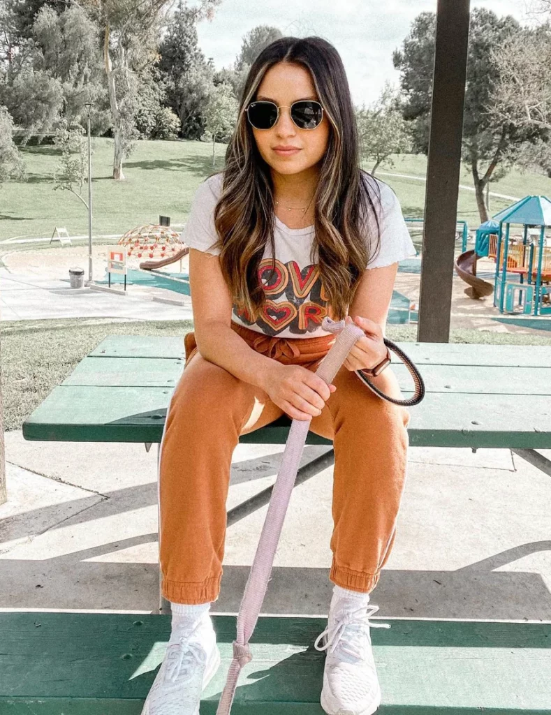 White Graphic T-Shirt + Rust Jogger Pants + White Sneakers