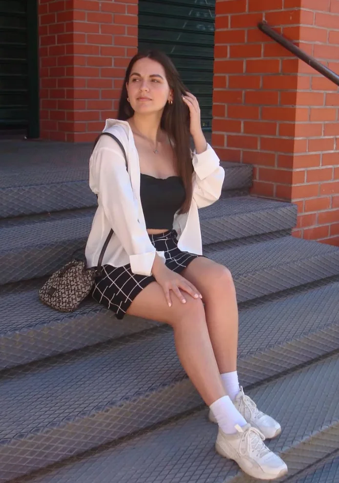 White Oversized Shirt + Black Crop Top + Plaid Mini Skirt + Sneakers